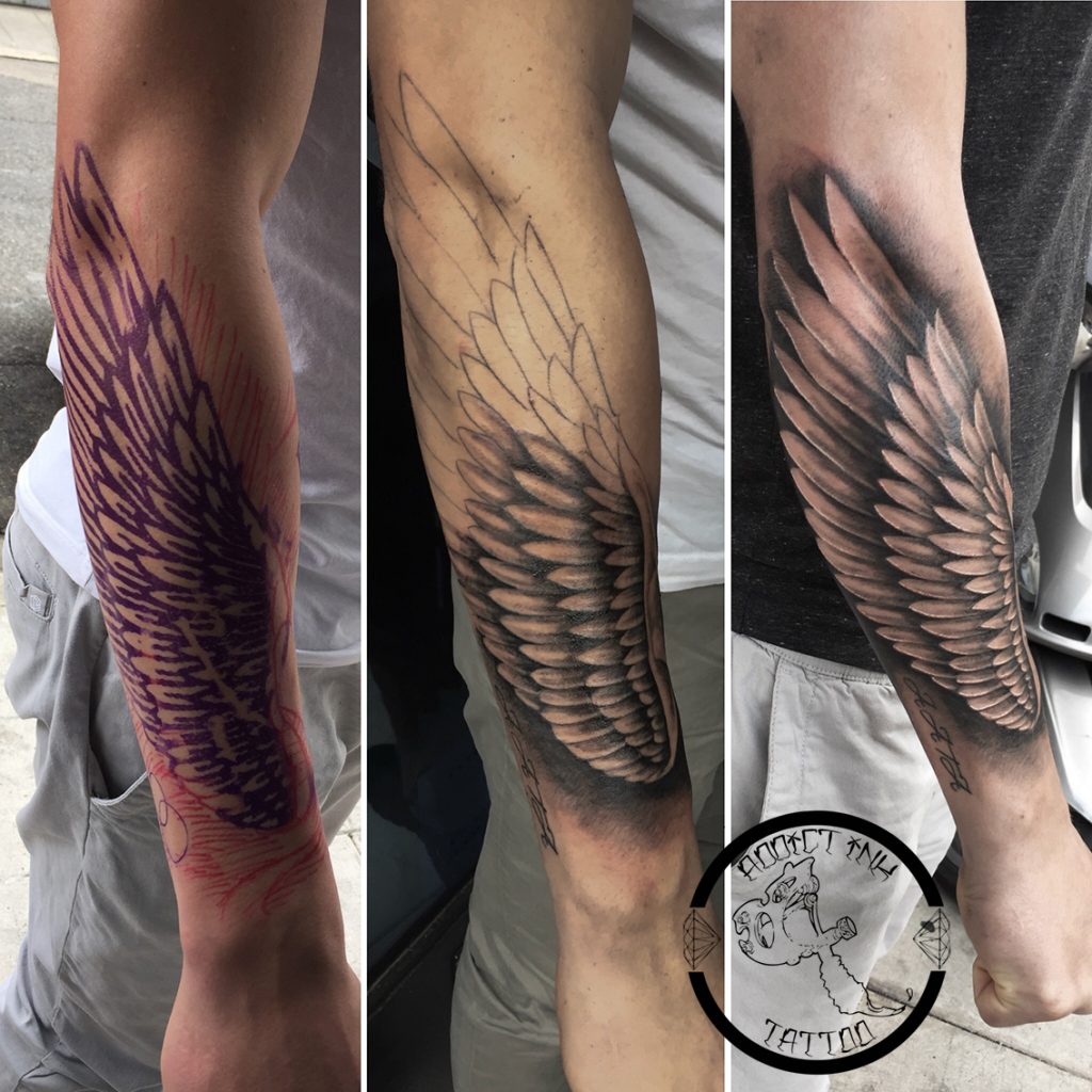 Tatouage aile realiste noir et gris